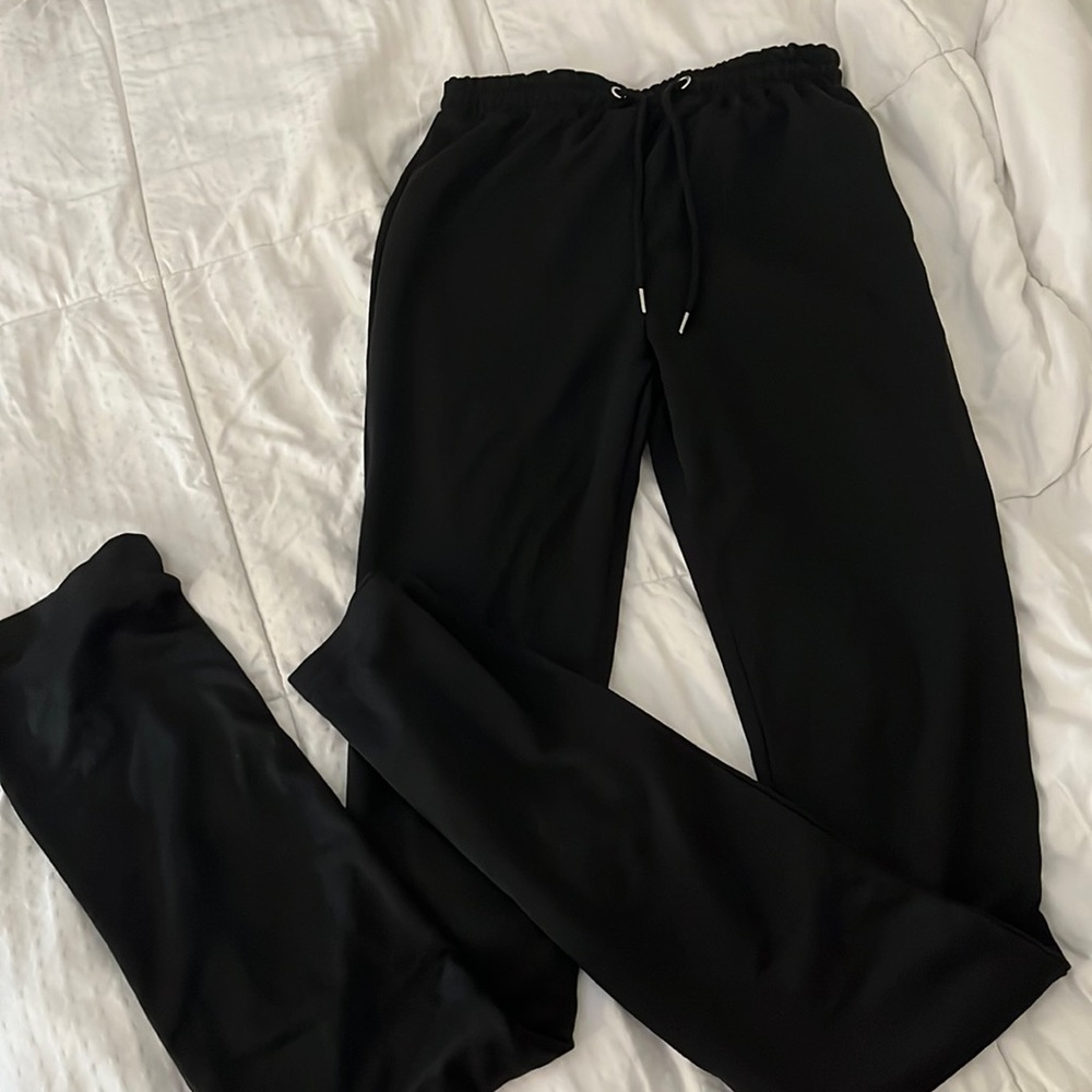 NEVER WORN black stacked sweats! Guaranteed to make your booty pop! 🙌